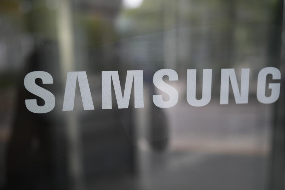 The logo of the Samsung is seen at the Samsung Electronics' Seocho building in Seoul, South Korea, Friday, July 5, 2024. Unionized workers at Samsung Electronics declared an indefinite strike Wednesday, July 10 to pressure South Korea’s biggest company to accept their calls for higher pays and other benefits. (AP Photo/Lee Jin-man)