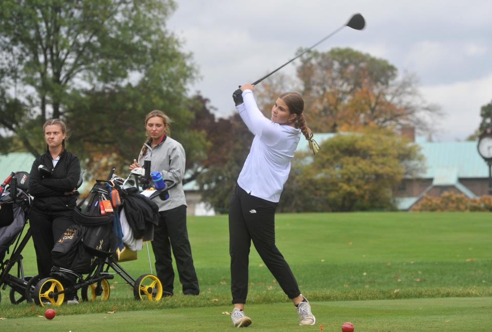 Colonel Crawford's Madison Gray tees off on No. 1 at Ohio State University's Gray Course in the Division II state tournament.