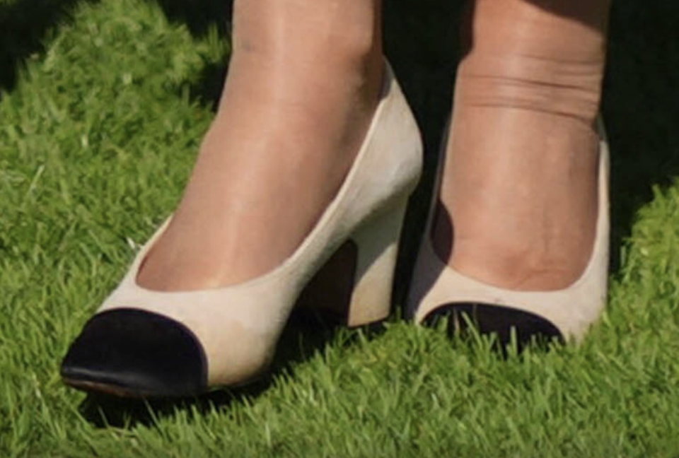 Queen Camilla wears vintage Chanel shoes.