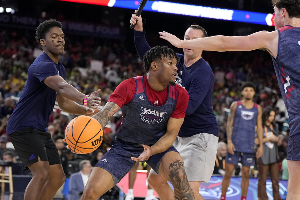 Florida Atlantic guard Alijah Martin practices for their Final Four college basketball game in the NCAA Tournament on Friday, March 31, 2023, in Houston. San Diego State and Florida Atlantic play on Saturday. (AP Photo/Brynn Anderson)