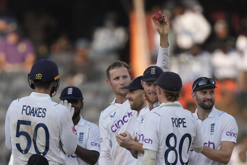 England's Tom Hartley raises the ball as he celebrates his five-wicket haul after England won the first cricket test match against India in Hyderabad, India, Sunday, Jan. 28, 2024. (AP Photo/Mahesh Kumar A.)