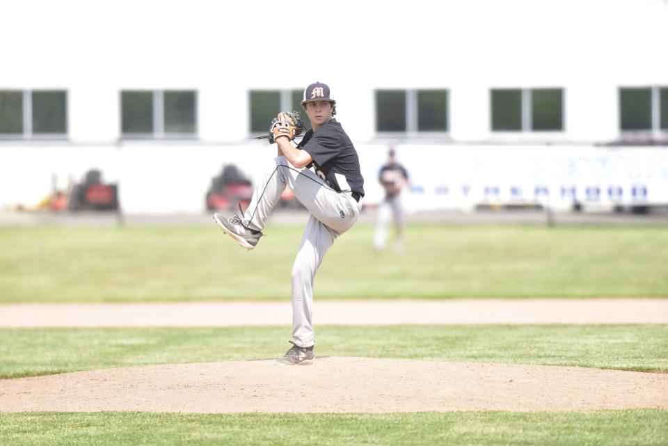 Marine City's Josh VandeVyver winds up to throw a pitch during the Mariners' 8-3 win over Macomb Lutheran North in a Division 2 district final at Richmond High School on Saturday.