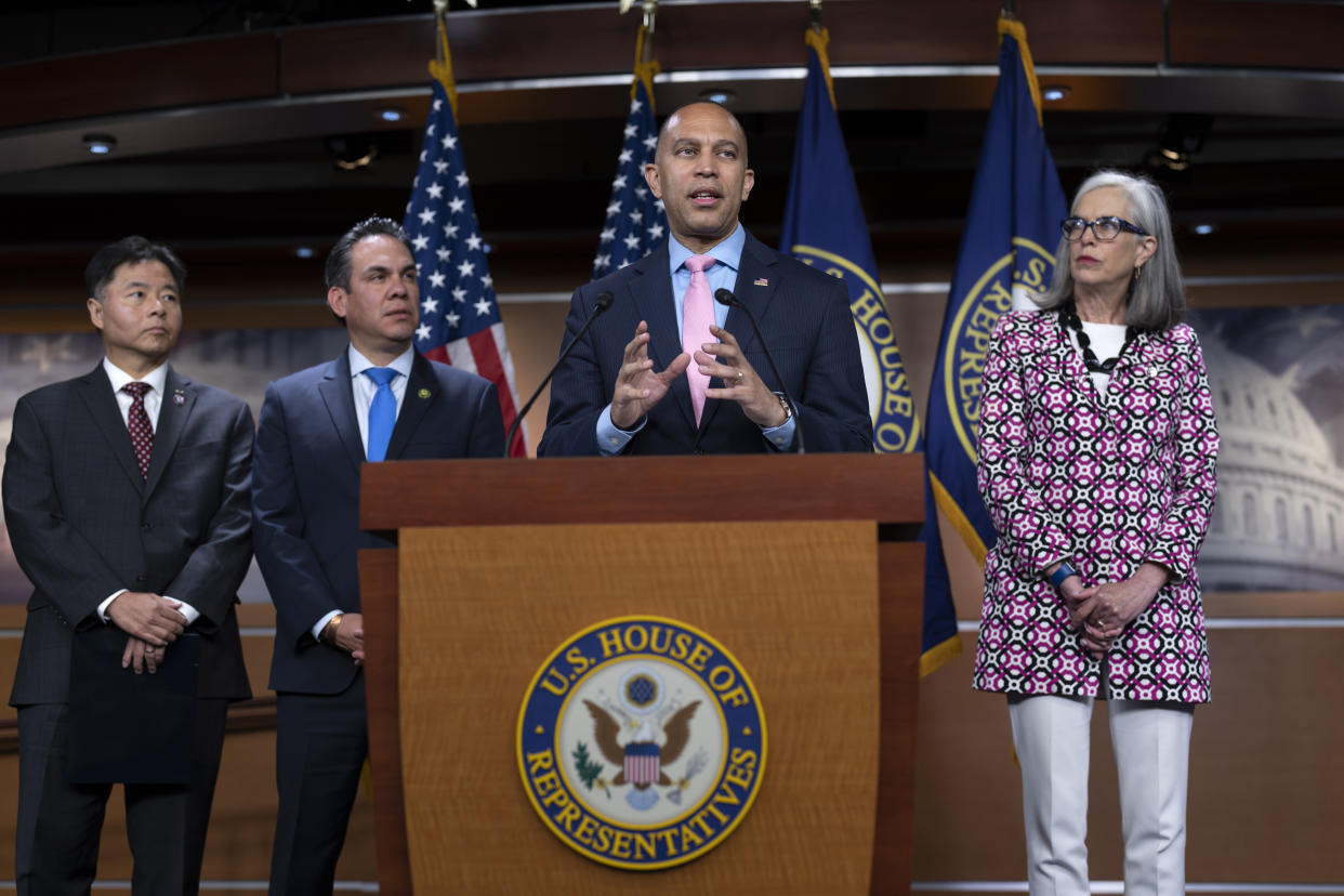 House Minority Leader Hakeem Jeffries, D-N.Y., joined from left by Rep. Ted Lieu D-Calif., the Democratic Caucus vice chair, Rep. Pete Aguilar, D-Calif., the Democratic Caucus chair, and Rep. Katherine Clark, D-Mass., the Democratic whip, talks to reporters about the closed-door meeting they had with fellow Democrats on the debt limit deal, at the Capitol in Washington, Wednesday, May 31, 2023. The agreement negotiated by Speaker of the House Kevin McCarthy, R-Calif., and President Joe Biden, will be voted on in the House later tonight. (AP Photo/J. Scott Applewhite)