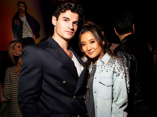 <p>Lexie Moreland/WWD/Getty</p> Paul Forman and Ashley Park at Saks Fifth Avenue's New York Fashion Week Kickoff Party on February 8, 2023