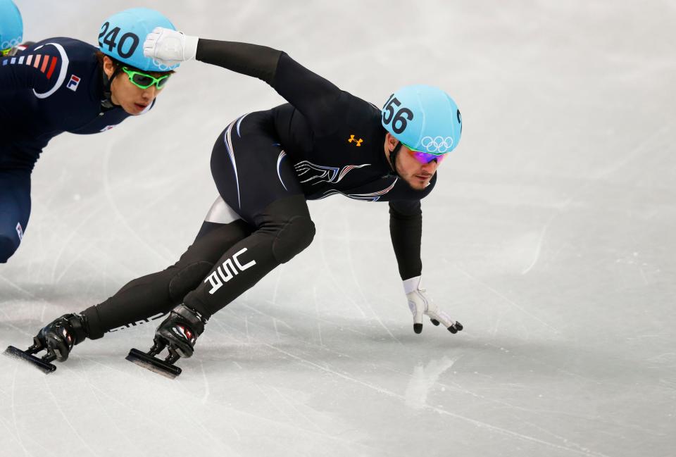 Eduardo Alvarez (USA) skates in the short track speed skating men's 500m during the Sochi 2014 Olympic Winter Games at Iceberg Skating Palace on Feb. 18, 2014.