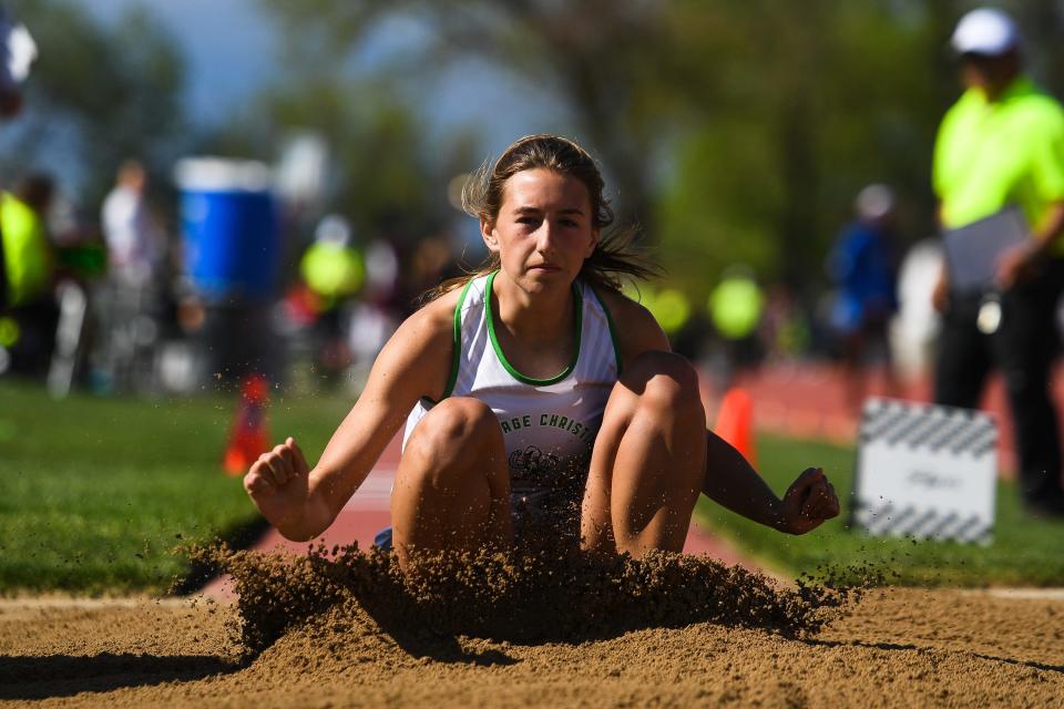 Heritage Christian's Kristin Osborne competes in the Class 2A triple jump at the Colorado high school track and field state meet at Jeffco Stadium on Thursday, May 18, 2023, in Lakewood, Colo.