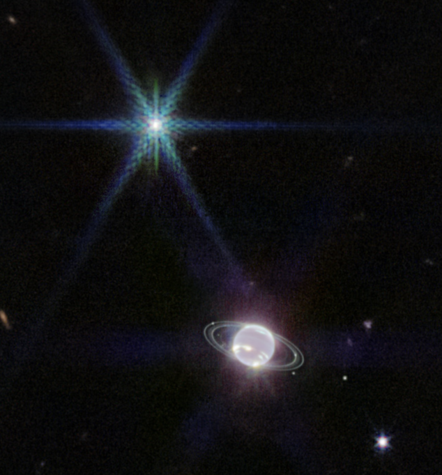 海王星系統。 左上角是海王星的衛星海衛一 (Triton) ，帶有韋伯獨特的八個衍射尖峰，這是望遠鏡結構的產物。 (NASA, ESA, CSA, STScI; Joseph DePasquale (STScI))