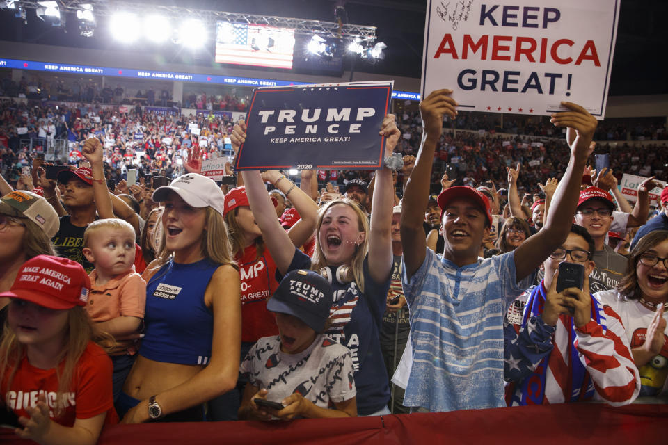 Supporters of President Donald Trump cheer as he arrives to speak at a campaign rally at the Santa Ana Star Center, Monday, Sept. 16, 2019, in Rio Rancho, N.M. (AP Photo/Evan Vucci)