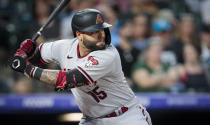 Arizona Diamondbacks' Emmanuel Rivera waits for a pitch in the fifth inning of a baseball game against the Colorado Rockies in Denver, Saturday, Aug. 13, 2022. (AP Photo/Joe Mahoney)