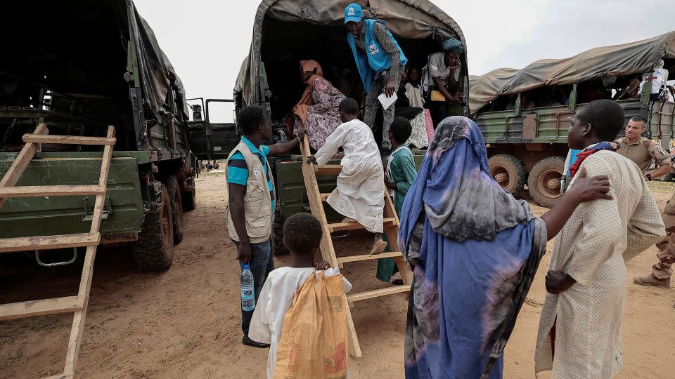 Sudanese people travel to a refugee camp in Ourang on the outskirts of Adre, Chad in July. More than one million people have fled Sudan into neighboring countries since April, the UN reported. - Zohra Bensemra/Reuters