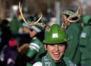 Fan Alexei Bashutsky sports antlers on his helmet prior to 101st Grey Cup game championship football game in Regina, Saskatchewan November 24, 2013. REUTERS/Todd Korol (CANADA - Tags: SPORT FOOTBALL)