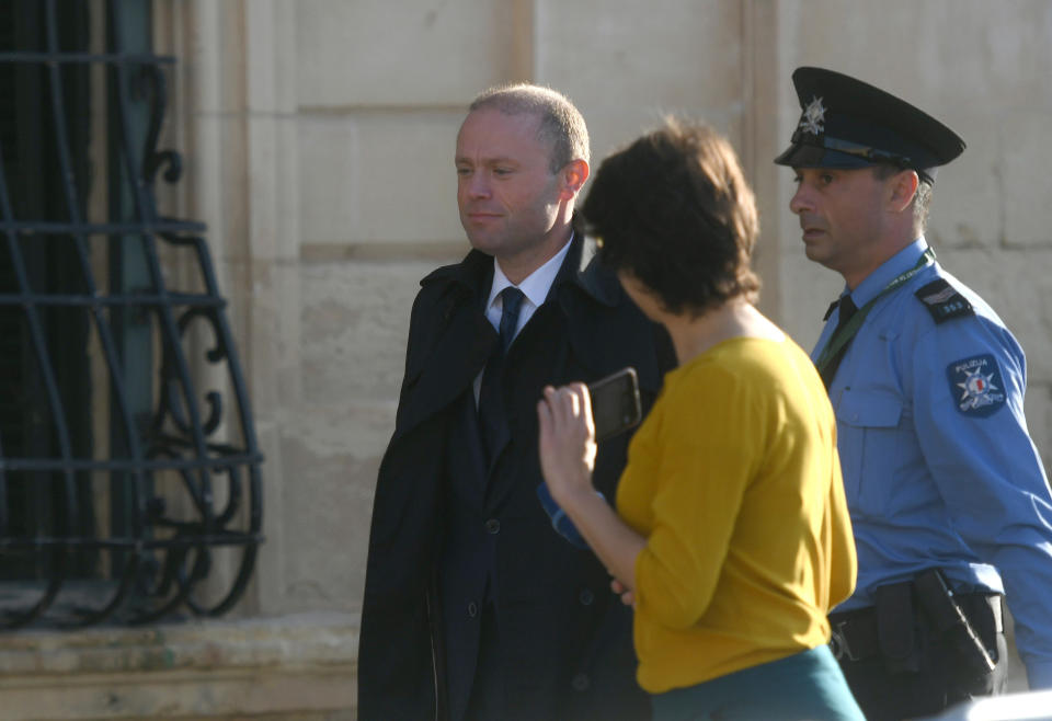 Malta Prime Minister Joseph Muscat is seen as he enters his office at Castille, in Valletta, Malta, Tuesday, Dec. 3, 2019, where he met a delegation of European Union lawmakers after an investigation into the murder of leading investigative journalist Daphne Caruana Galizia implicated Prime Minister Joseph Muscat’s chief of staff. (AP Photo/Rene Rossignaud)