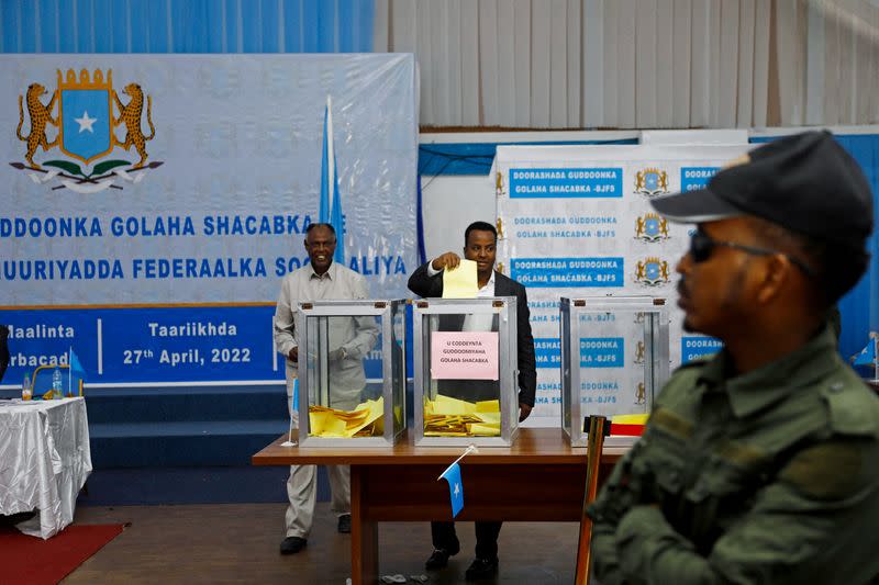 FILE PHOTO: A Somali lawmaker casts a ballot during the elections for the speaker of the lower house of parliament in Mogadishu