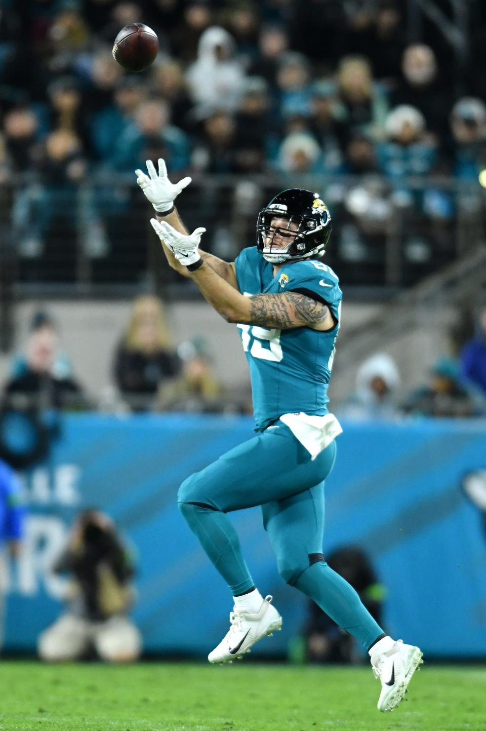 Jacksonville Jaguars tight end Luke Farrell (89) goes up to catch a late first quarter pass for a first down to the 35 yard line. The Jacksonville Jaguars hosted the Baltimore Ravens at EverBank Stadium in Jacksonville, Florida Sunday Night, December 17, 2023. The Jaguars trailed 10 to 0 at the half. [Bob Self/Florida Times-Union]