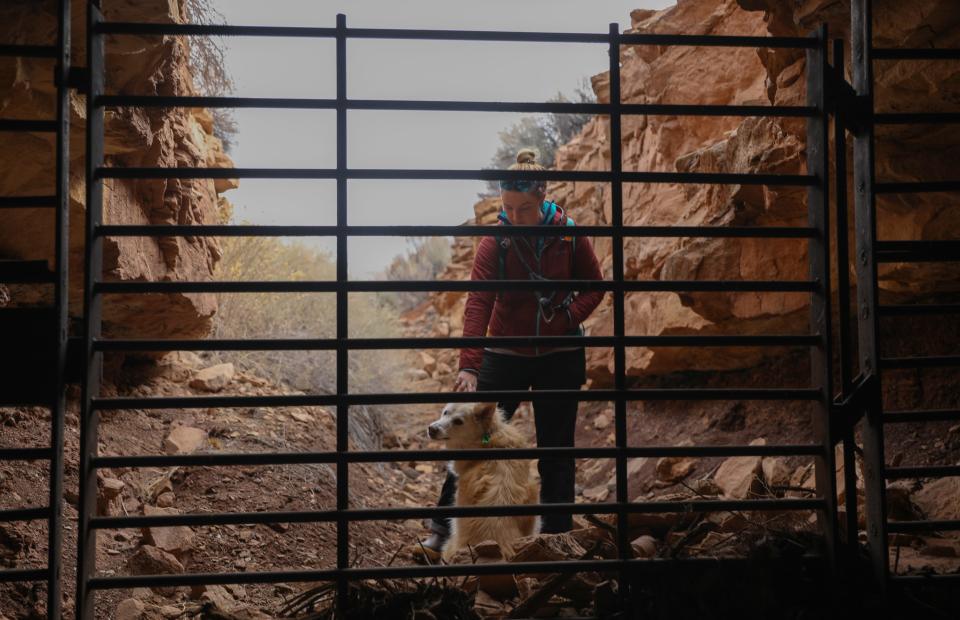 Kya Marienfeld, a wildlands attorney with the Southern Utah Wilderness Alliance, visits the entrance of an abandoned mine on the Bears Ears landscape.