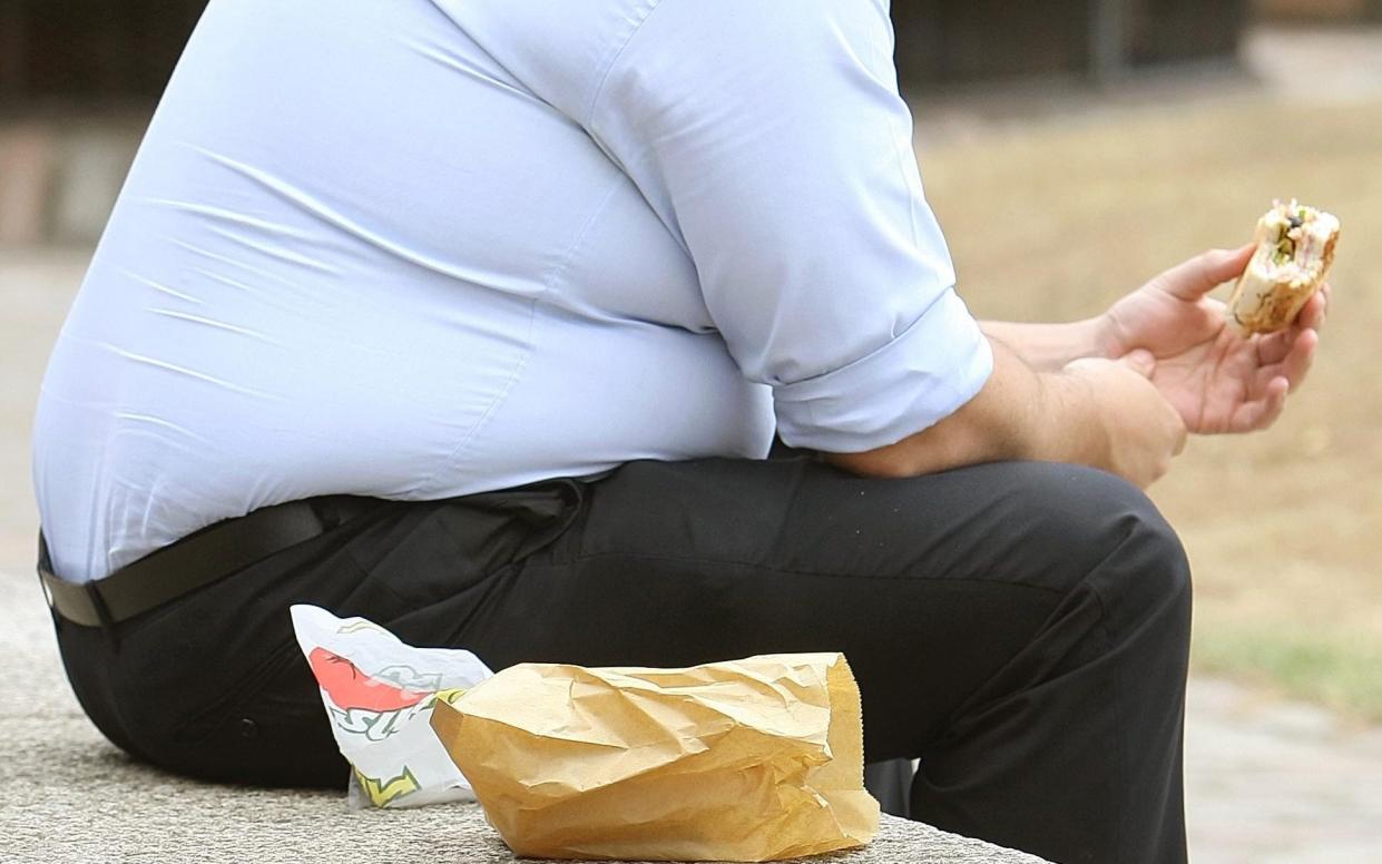 Man eating fast food