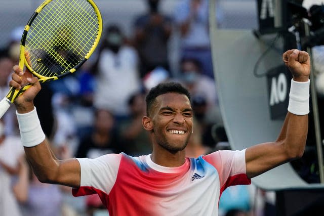 Felix Auger-Aliassime celebrates his win 