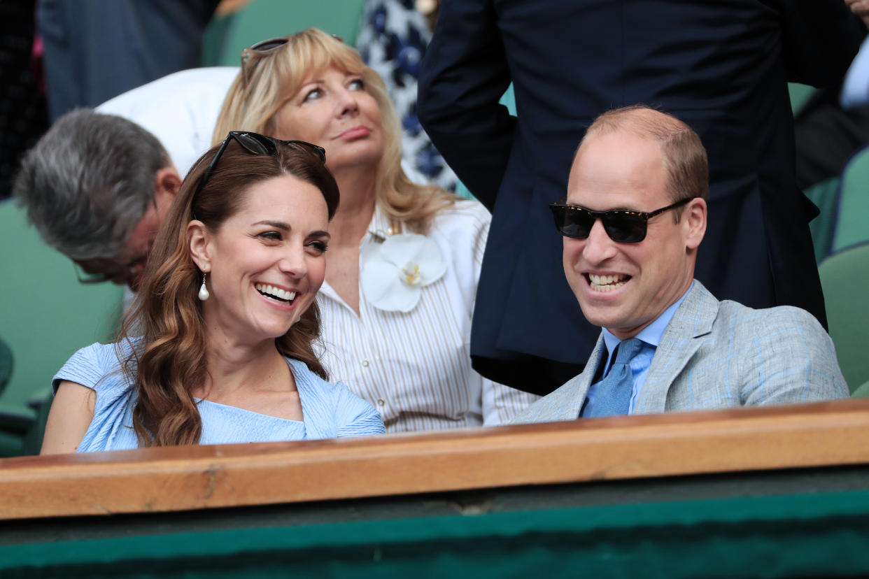 LONDON, ENGLAND - JULY 14: Prince William, Duke of Cambridge speaks to his wife, Catherine, Duchess of Cambridge in the Royal Box on Centre Court on Day 13 of The Championships - Wimbledon 2019 at the All England Lawn Tennis and Croquet Club on July 14, 2019 in London, England. (Photo by Simon Stacpoole/Offside/Getty Images)