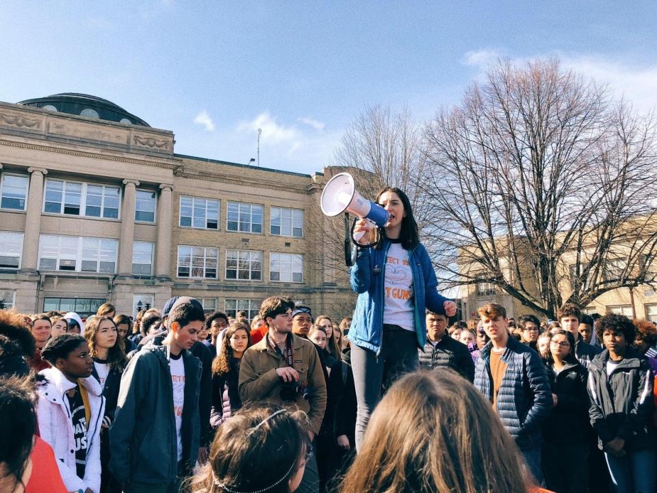 Kate Eder, executive director of 50 Miles More, is helping organize over 500 walkouts nationwide to encourage millennials to vote on Nov. 6. Here she is seen leading a rally for fellow students. (Photo: 50 Miles More)