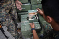 <p>Syrian Democratic Forces (SDF) fighters unload boxes of ammunition near Raqqa city, Syria June 7, 2017. (Photo: Rodi Said/Reuters) </p>