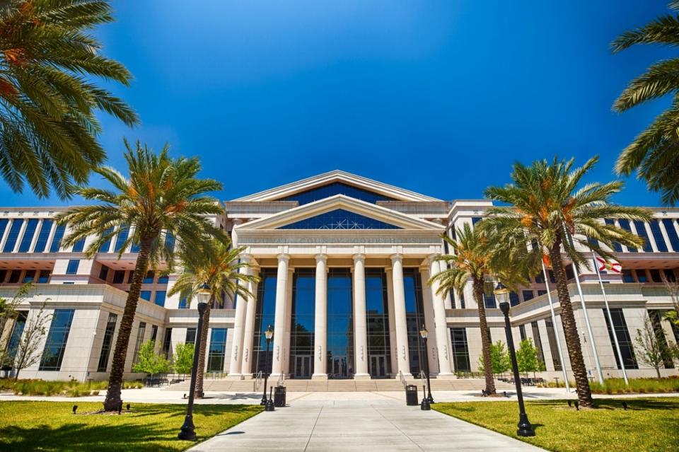 Large government building with palm trees in Jacksonville, FL