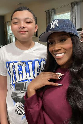 coco gamble SWV's Coko Gamble poses with her cousin's son, DJ, 12.