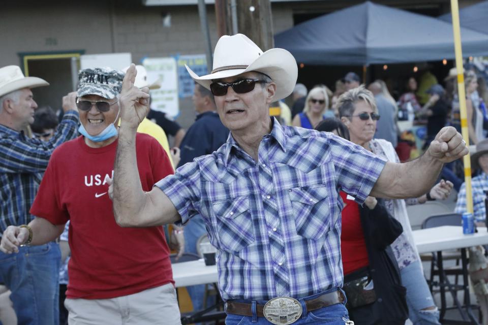 The Asphalt Cowboys started their lineup of Rodeo Week activities with a fast-draw contest, line-dance lessons and a street dance at their clubhouse off Auditorium Drive on Friday night, May 7, 2021.