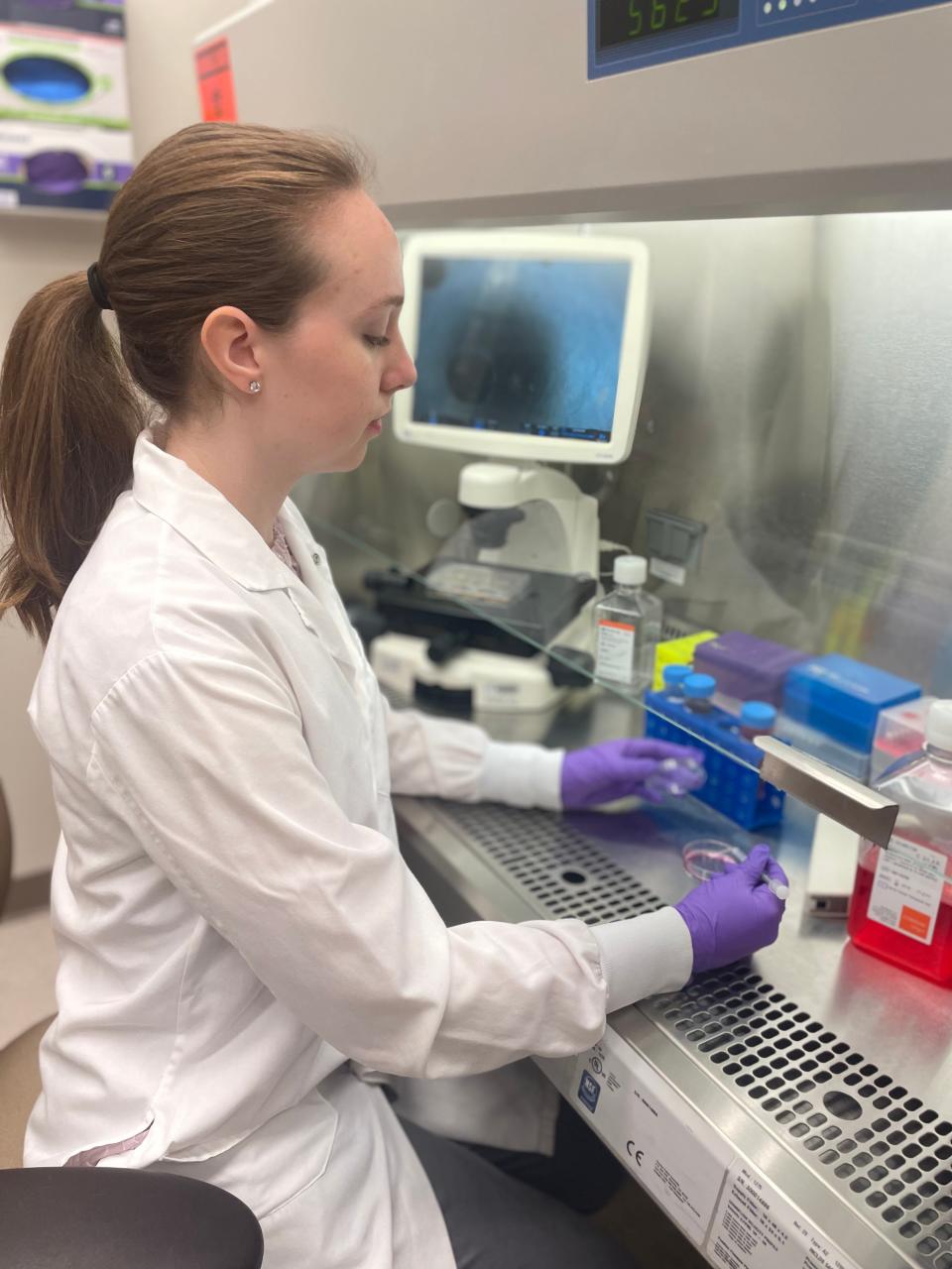 Brianna Bembenek works in the lab at the Mayo Clinic.