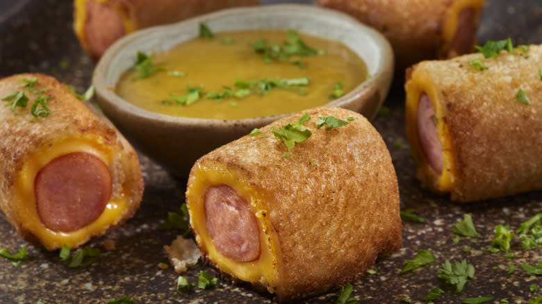 Grilled cheese pigs in blankets with mustard dip