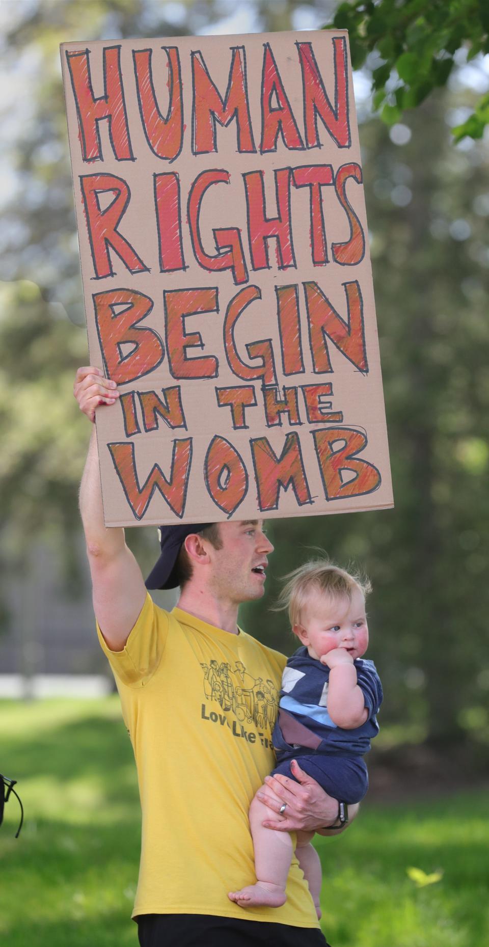 Pro Life advocate Mike McGuire and his 10-month-old son Beckett gathered with other supporters at Crogan Park on May 15, 2022, in Fairlawn, Ohio.