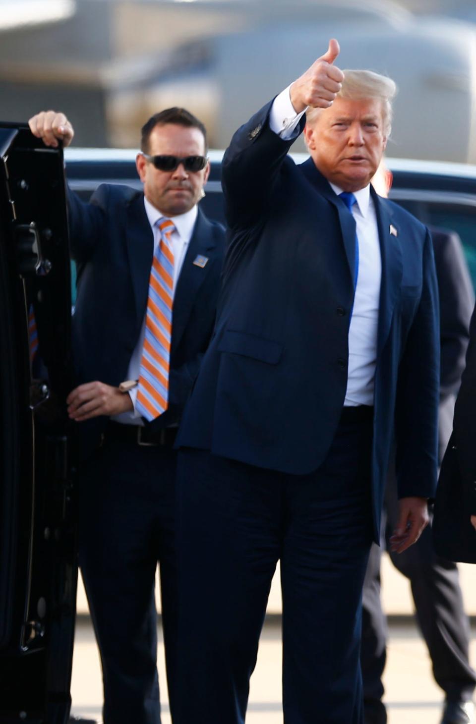 President Donald Trump arrives at Memphis International Airport ahead of his rally at the Landers Center in Southaven on Tuesday, Oct. 2, 2018.