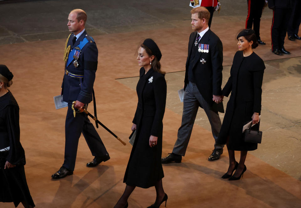 Social media expressed mixed reactions about Prince Harry and his wife holding hands at Westminster Hall last week. (Getty Images)