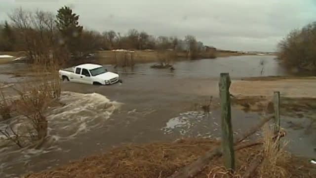 Girl rescued from icy flood waters in Manitoba