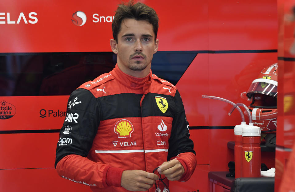 Ferrari driver Charles Leclerc of Monaco in his garage prior to the qualifying session ahead of the Formula One Grand Prix at the Spa-Francorchamps racetrack in Spa, Belgium, Saturday, Aug. 27, 2022. The Belgian Formula One Grand Prix will take place on Sunday. (AP Photo/Geert Vanden Wijngaert, Pool)