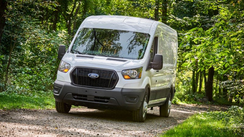 A photo of a white Ford Transit van. 