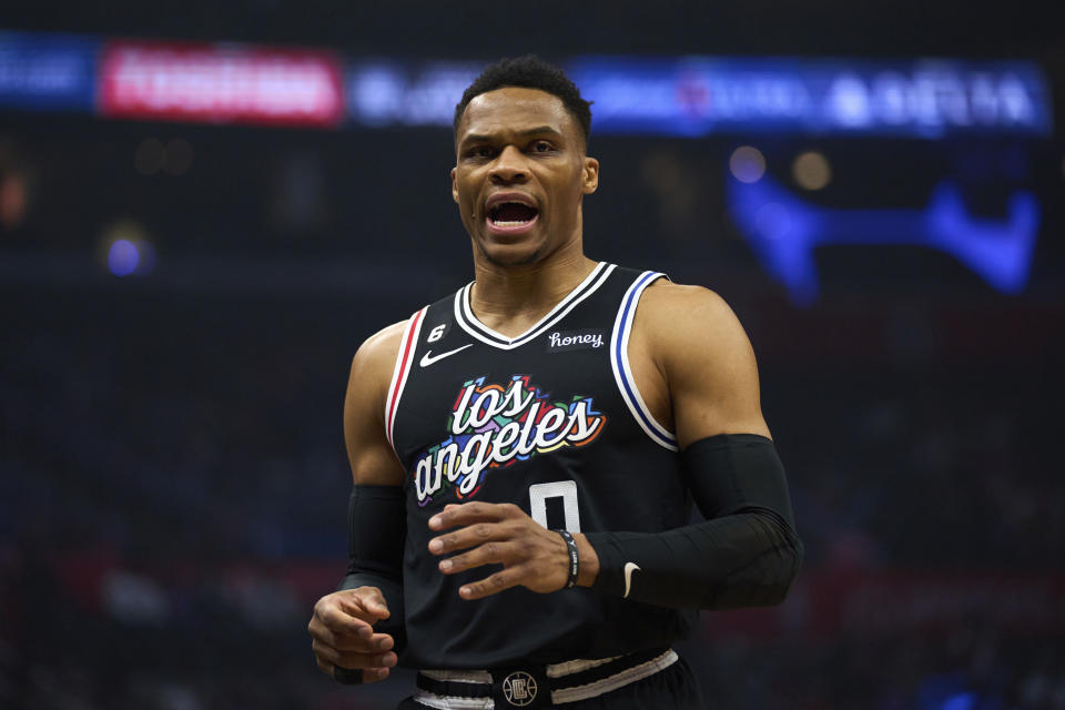 Los Angeles Clippers guard Russell Westbrook (0) reacts after scoring during the first half of an NBA basketball game against the Orlando Magic Saturday, March 18, 2023, in Los Angeles. (AP Photo/Allison Dinner)