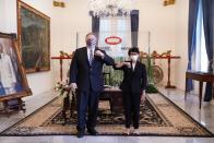 Indonesian Foreign Minister Retno Marsudi greets U.S. Secretary of State Mike Pompeo following their meeting in Jakarta