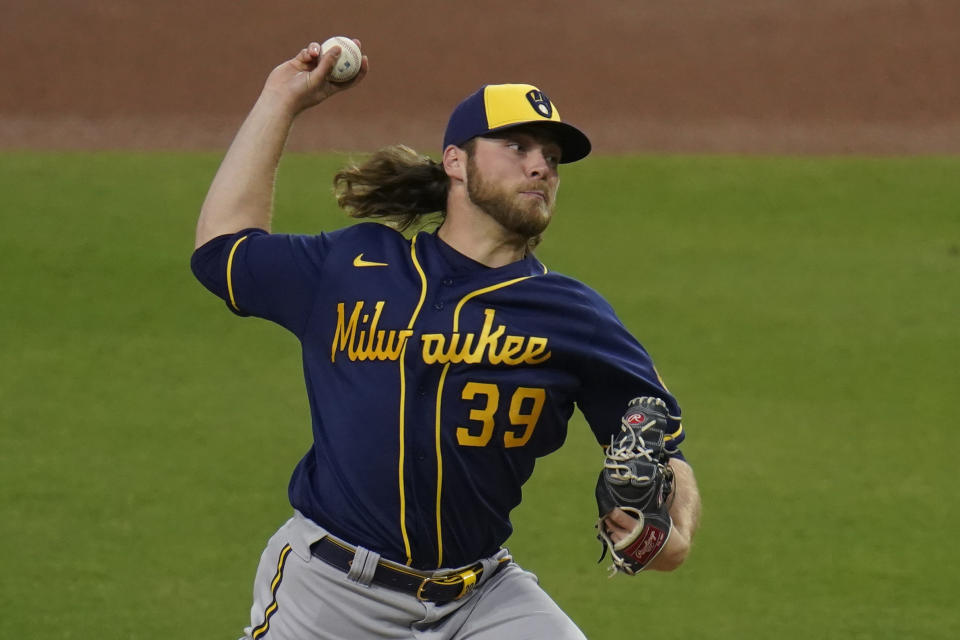 Milwaukee Brewers starting pitcher Corbin Burnes works against a San Diego Padres batter during the first inning of a baseball game Tuesday, April 20, 2021, in San Diego. (AP Photo/Gregory Bull)