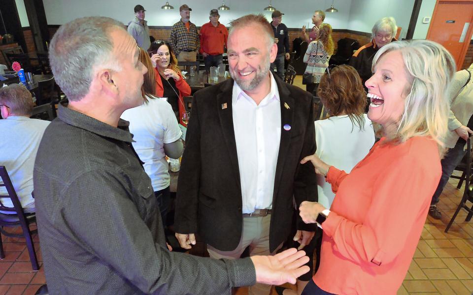 Jake Banta, center, the Republican nominee in the 4th Legislative District for the Pennsylvania House of Representatives, talks with Bill Snyder, left, and Kelli Dietz at Uncle Charlie's Pub & Eatery in Edinboro on May 17, the day of the Pennsylvania primary.