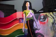 This Wednesday, June 19, 2019, photo shows a detail of one of the Pride and Joy window display at the Macy's flagship store in New York. For Pride month, retailers across the country are selling goods and services celebrating LGBTQ culture. Macy’s flagship store is adorned with rainbow-colored Pride tribute windows, set in the same space as its famous Christmas displays. (AP Photo/Mary Altaffer)