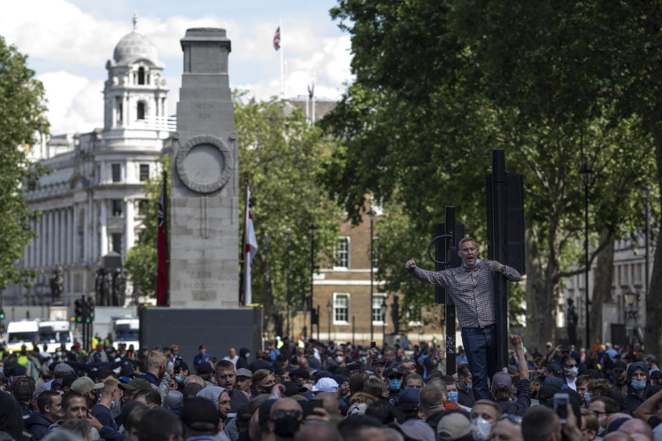 LONDON, ENGLAND - JUNE 13: Activists gather on Whitehall as far-right linked groups gather around London's statues on June 13, 2020 in London, United Kingdom. Following a social media post by the far-right activist known as Tommy Robinson, members of far-right linked groups have gathered around statues in London. Several statues in the UK have been targeted by Black Lives Matter protesters for their links to racism and the slave trade.  (Photo by Dan Kitwood/Getty Images)