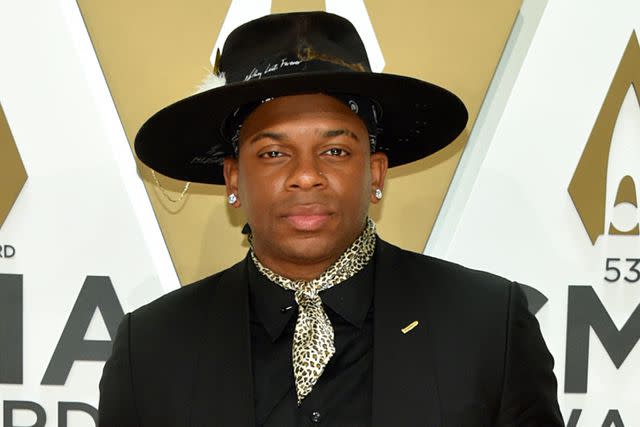 <p>John Shearer/WireImage</p> Jimmie Allen attends the CMA Awards in Nashville in 2019.