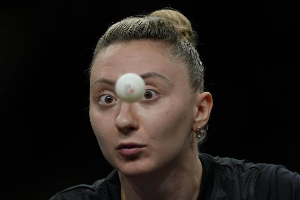 AP PHOTOS Table tennis players at the Paris Olympics keep their eyes