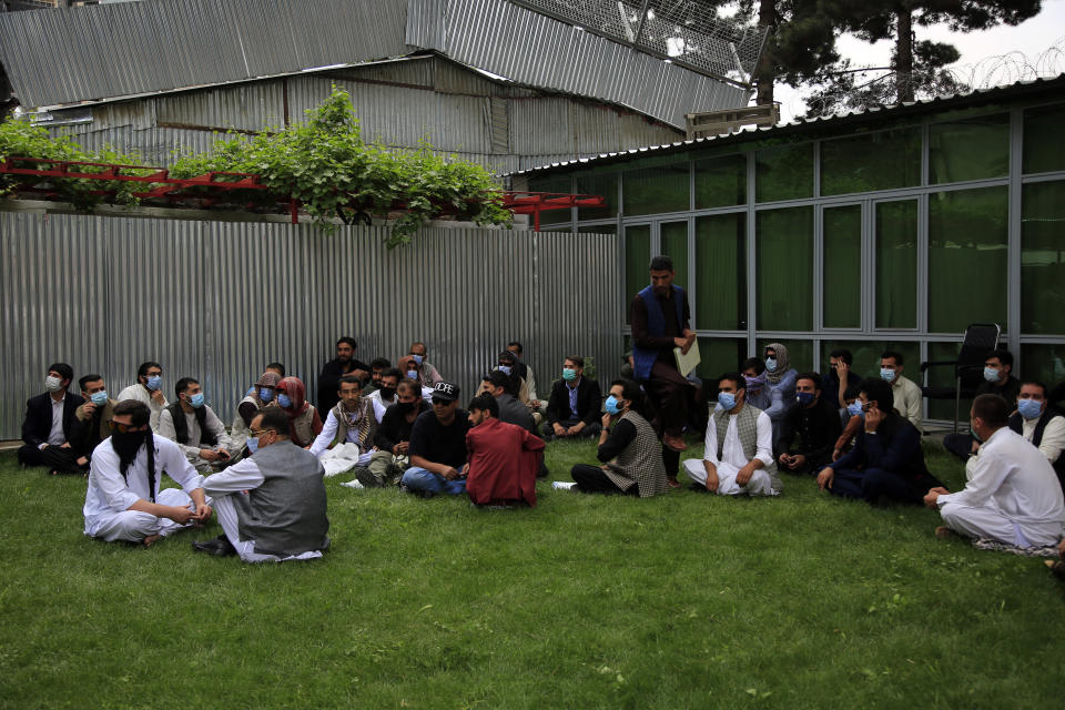 In this Friday, April 30, 2021, photo former Afghan interpreters gather during a protest against the U.S. government and NATO in Kabul, Afghanistan. (AP Photo/Mariam Zuhaib)