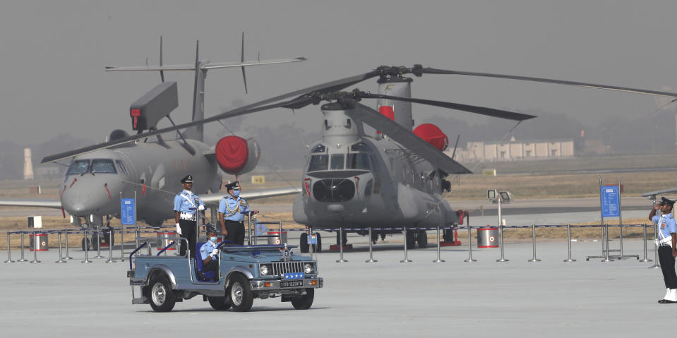 Indian Air Force chief Air Chief Marshal R K S Bhadauria inspects a guard of honor during Air Force Day parade at Hindon Air Force Station on the outskirts of New Delhi, India, Thursday, Oct. 8, 2020. (AP Photo/Manish Swarup)