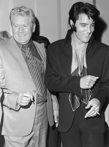 <p>Frank Edwards/Fotos International/Getty</p> Elvis Presley and his father, Vernon Presley, in 1970