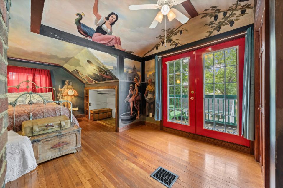 A home for sale in Akron's Kenmore neighborhood features artwork by late artist Ralph Herzog.
