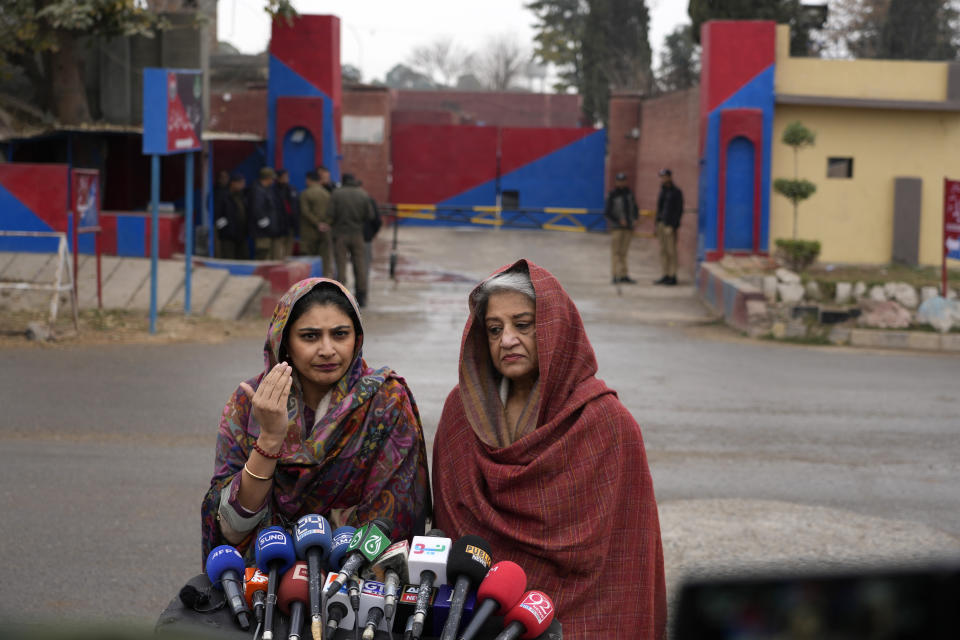 Gauhar Bano Qureshi, left, daughter, and Mehriene Qureshi, wife of Shah Mahmood Qureshi, a deputy leader of Pakistan's former Prime Minister Imran Khan's 'Pakistan Tehreek-e-Insaf' party, speak with media following a special court decision, outside the Adiyala prison, in Rawalpindi, Pakistan, Tuesday, Jan. 30, 2024. A Pakistani court on Tuesday sentenced former Prime Minister Khan and one of his party deputy Qureshi to 10 years in prison each, after finding them guilty of revealing official secrets. (AP Photo/Anjum Naveed)