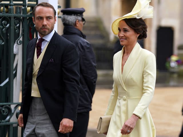 <p>Andrew Milligan - WPA Pool/Getty </p> Pippa and James Middleton arrive at the coronation of King Charles III and Queen Camilla in May 2023 in London, England