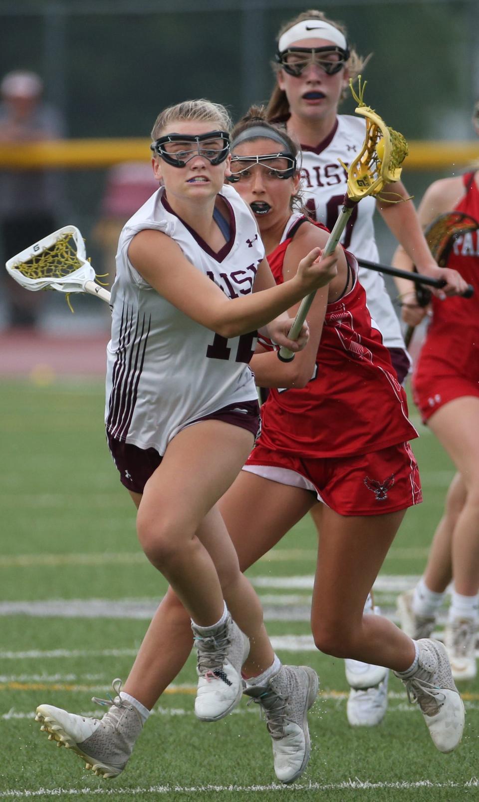 Carissa Schneider helps give Aquinas a balanced look on offense.